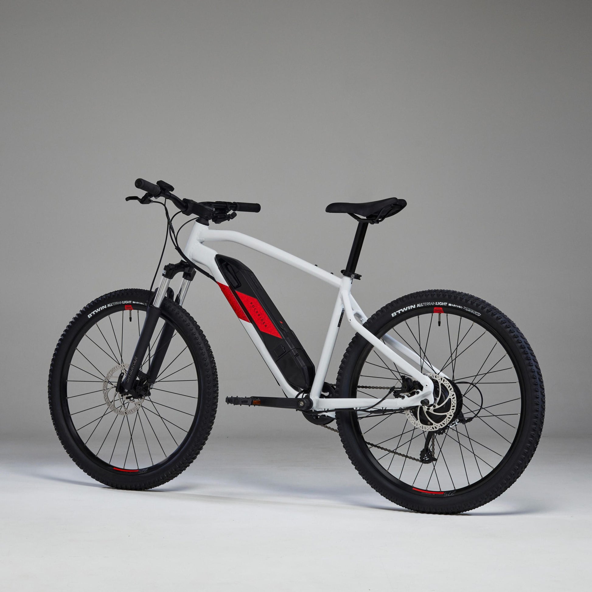 bicicleta eléctrica de montaña Rockrider E-ST 100 Blanco/Rojo 27,5″ con batería de 380 Wh